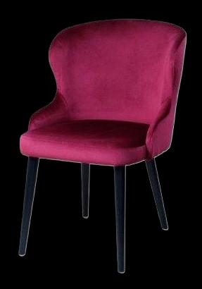 Rosa Samtstuhl mit schwarzen Beinen, elegant und modern im Design.