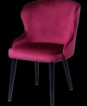 Rote Samt-Stuhl mit schwarzen Beinen, elegant und modern.