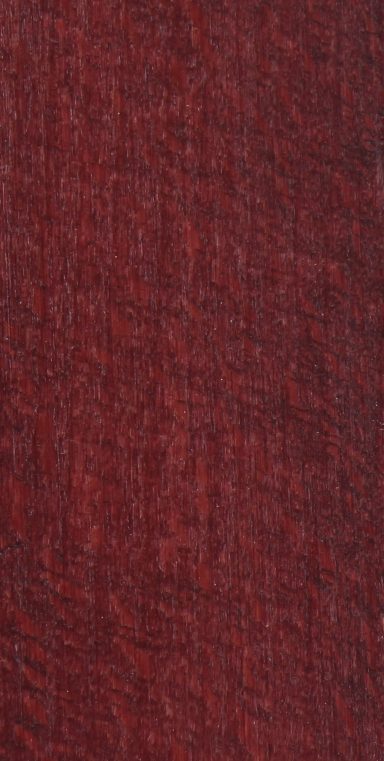 Cherry Ein einfarbiger, rotbrauner Stoff mit feiner Textur.