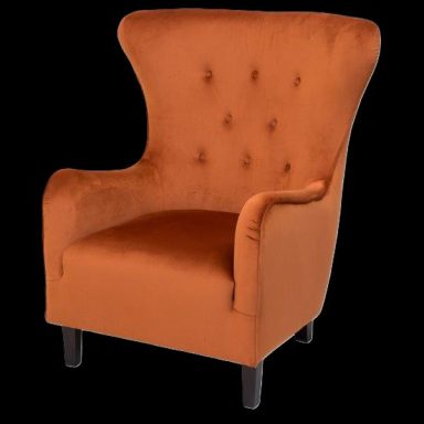 Ein orangefarbener Sessel mit hohen Armlehnen und Knopfdetails.