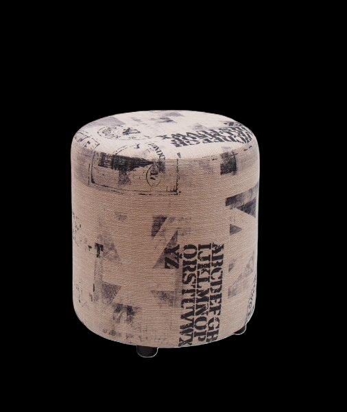 Runder Hocker mit grafischem Muster in neutralen Farben.